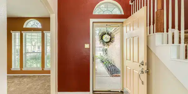 Image 4: Two story entry way provides a grand entrance and