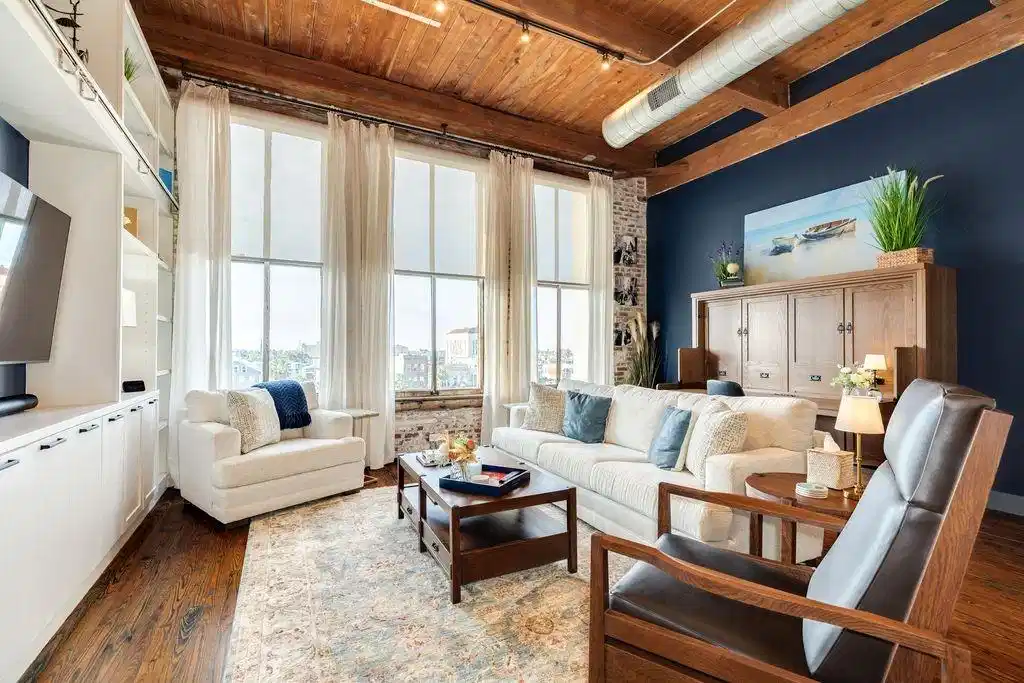 Image 1: Beautiful efficiency with a brick wall and windows