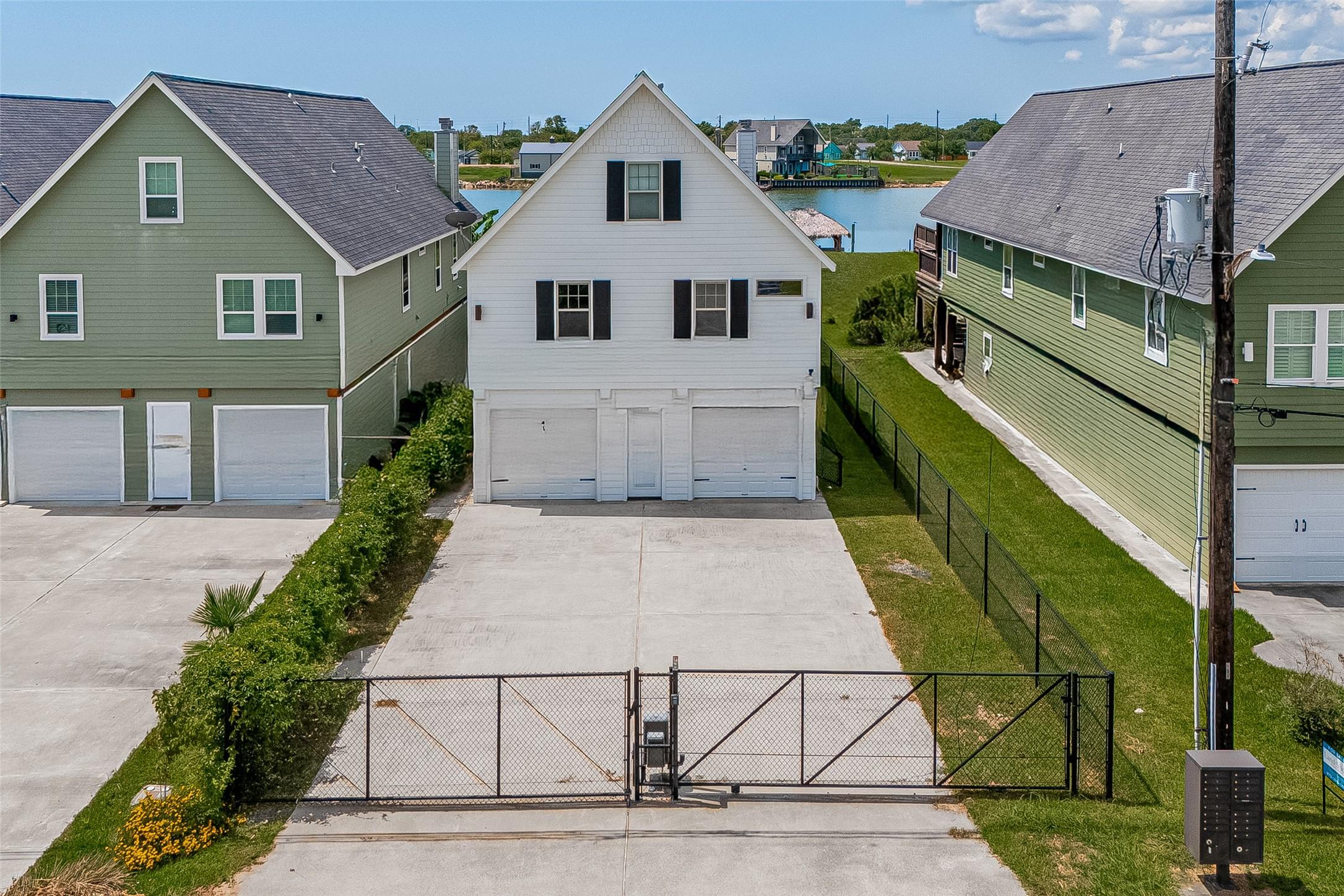 Image 2: Privacy fence on the front of the home, fully fenc