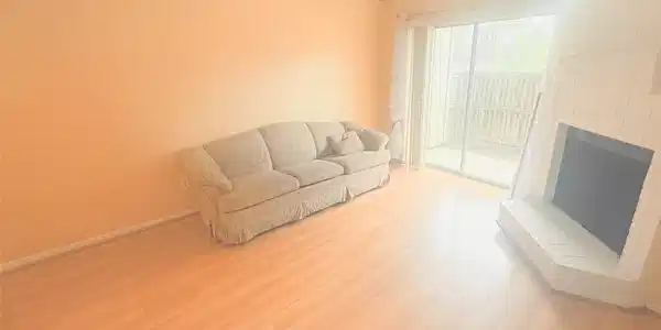 Image 2: Your living room is warm and inviting, with the co