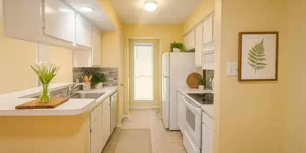 Image 3: *Virtually Staged* The kitchen is equipped with ap