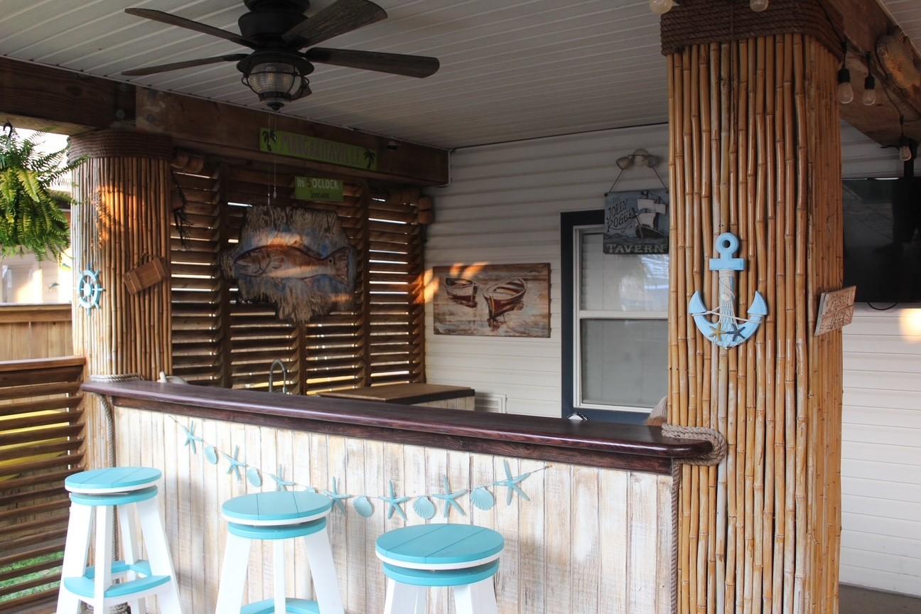 Image 1: view of bar area in the outdoor kitchen area