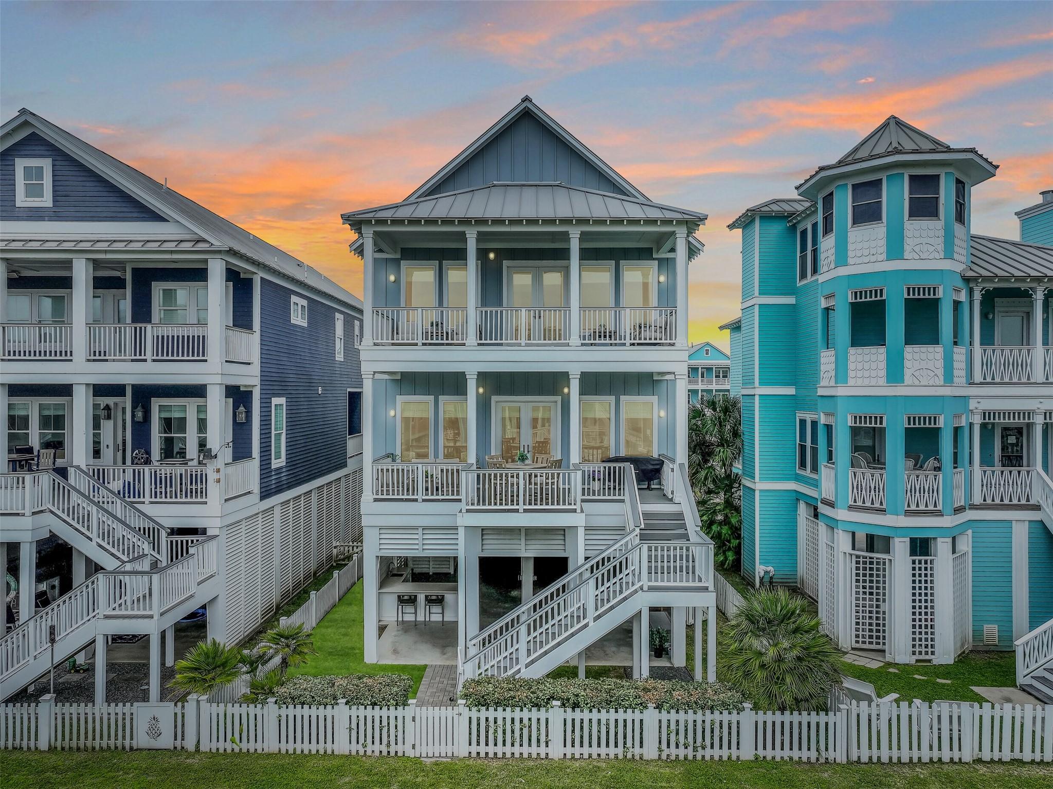 Image 2: At this stunning coastal retreat, classic beach ho