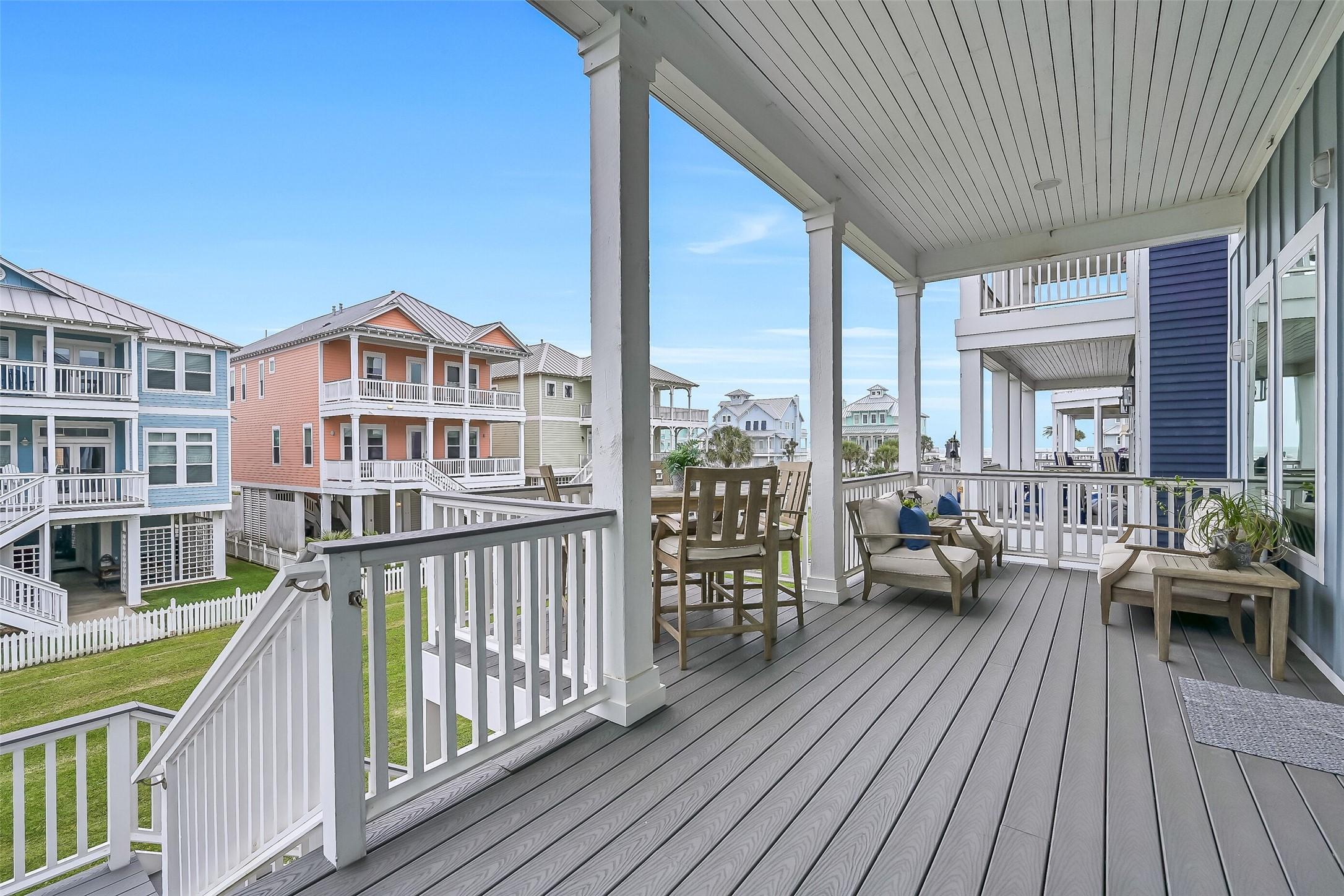 Image 4: Step up onto this spacious covered balcony featuri