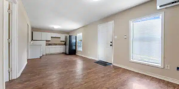 Image 2: View of kitchen from the living area.