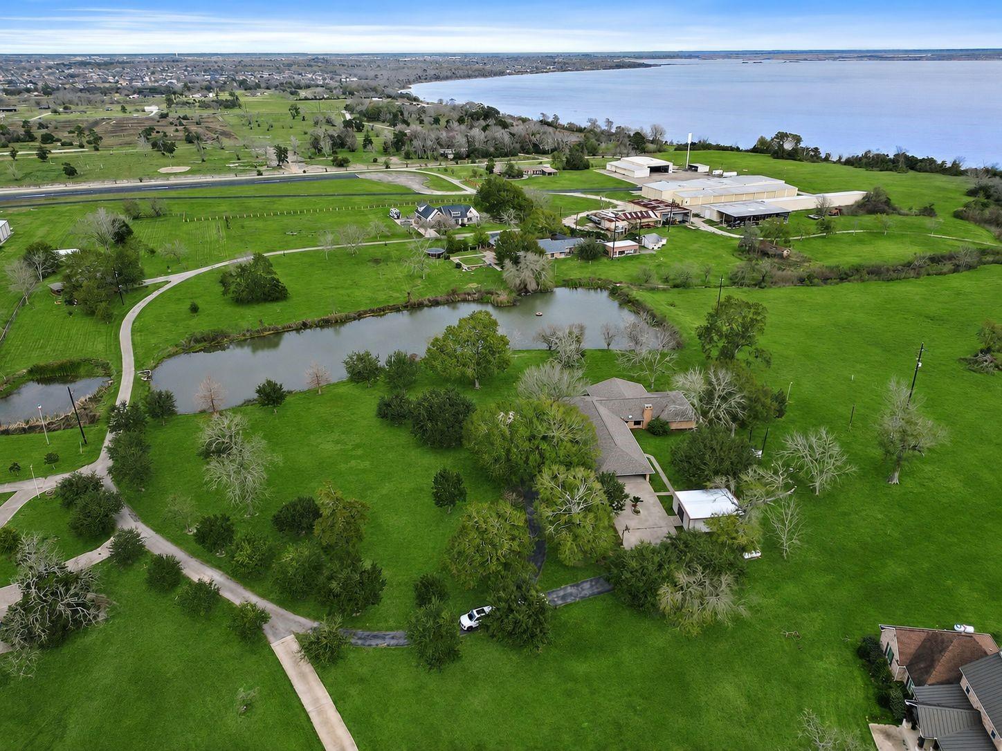 Image 3: Aerial View Showing Property and Runway