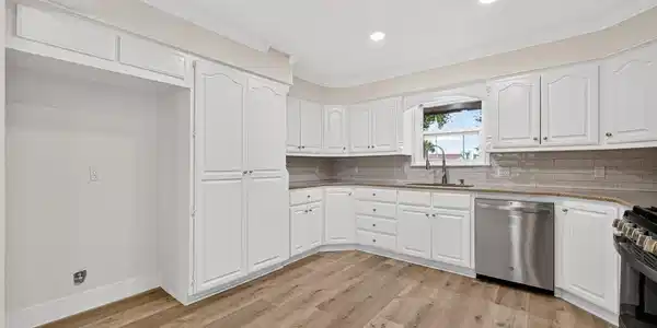 Image 3: Abundant amount of kitchen cabinets, plenty of cou
