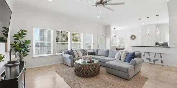 Image 3: Large windows allow natural light to pour into the