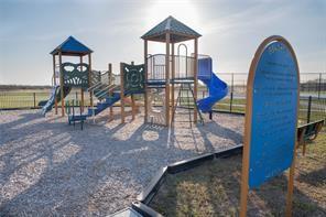 Image 4: This is a photo of a children's playground featuri