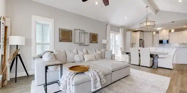 Image 3: Main living area: vaulted ceiling, open to kitchen