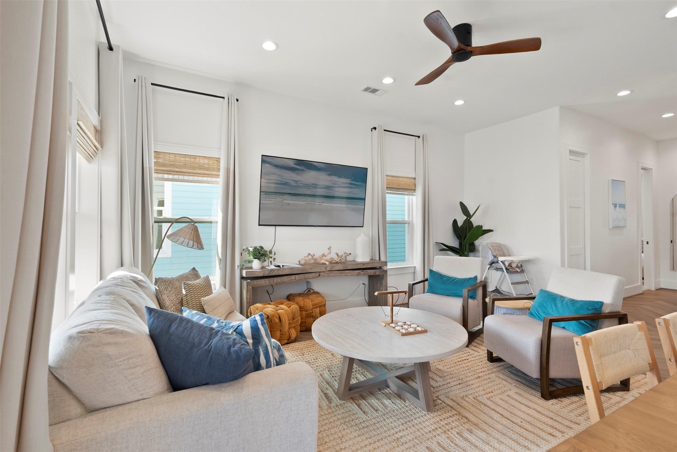Image 2: This open-concept space effortlessly blends kitche