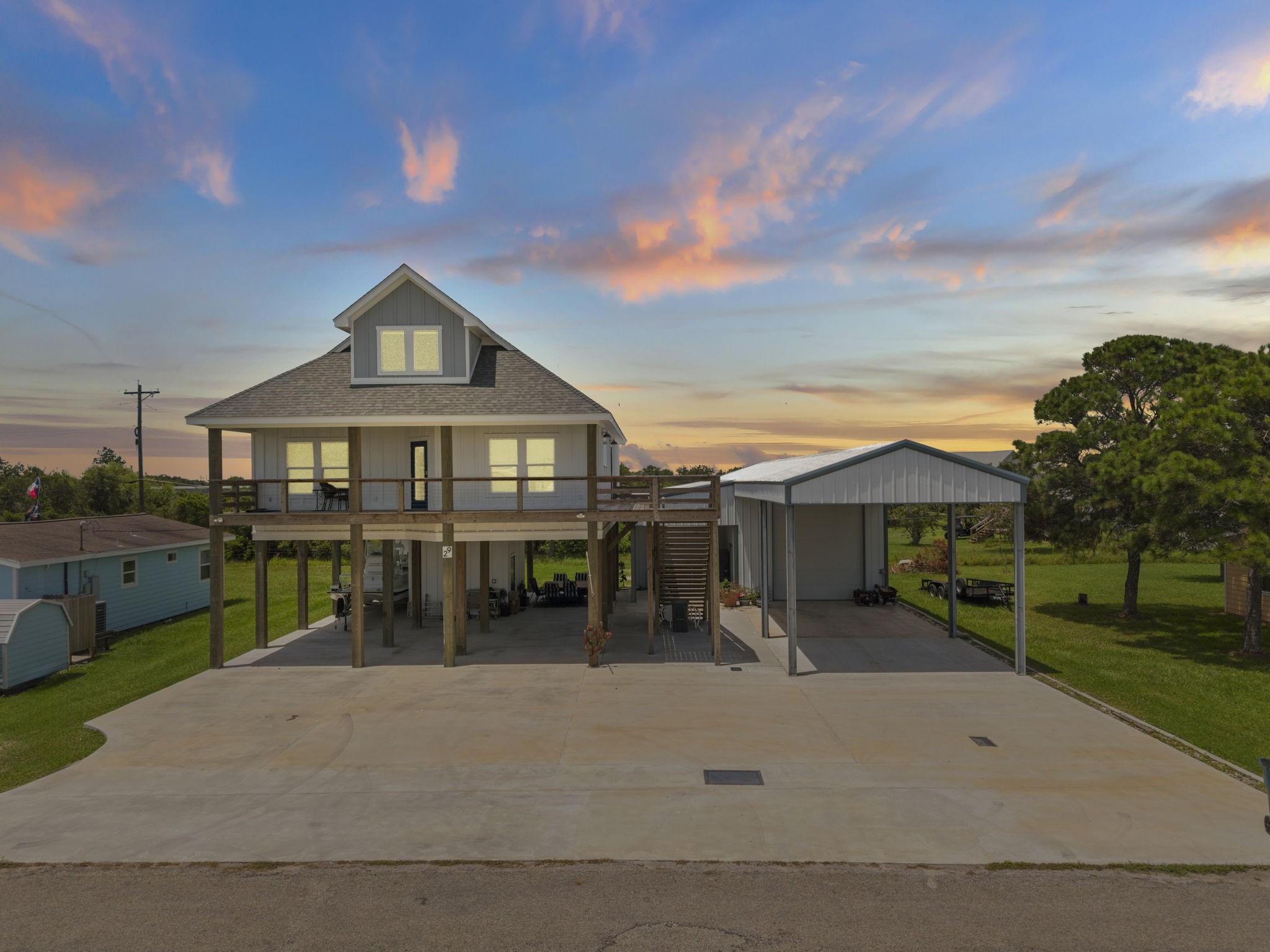 Image 1: This elevated residence offers expansive elevated