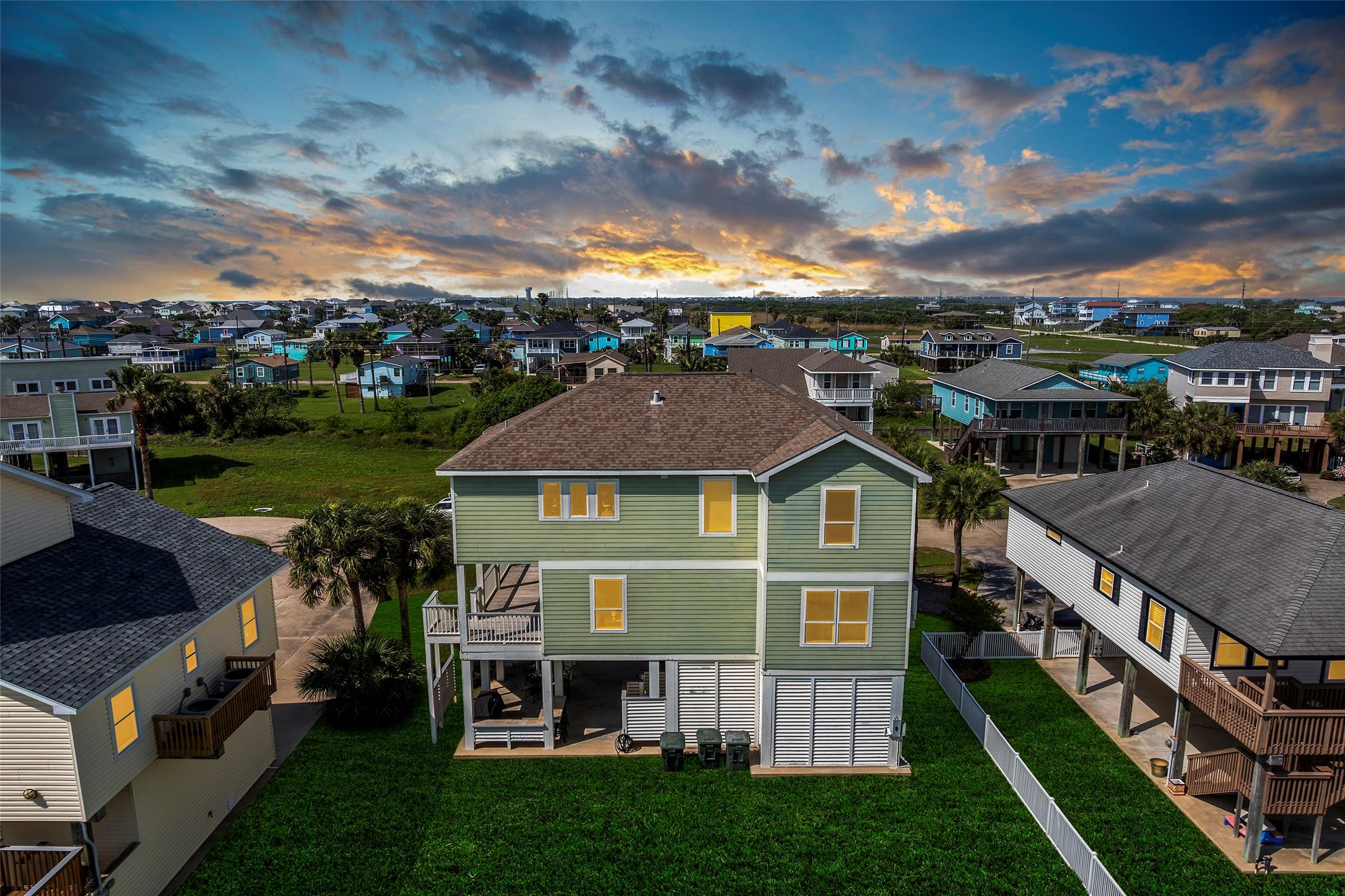 Image 3: Stunning sunset views from the front of the home.