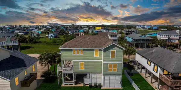 Image 3: Stunning sunset views from the front of the home.