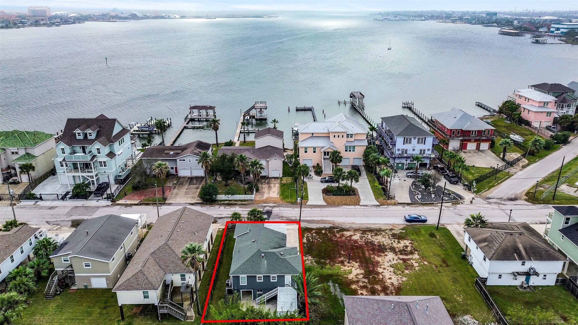 Image 2: Aerial shot emphasizing the home&rsquo;s location near t