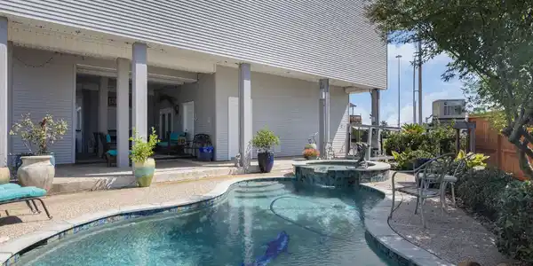 Image 3: Relax at the beautiful saltwater pool with spa wit