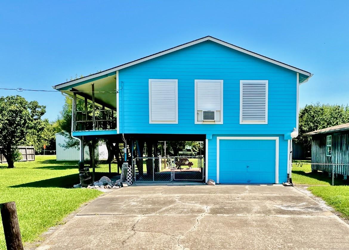 Image 2: The home has hurricane shutters.