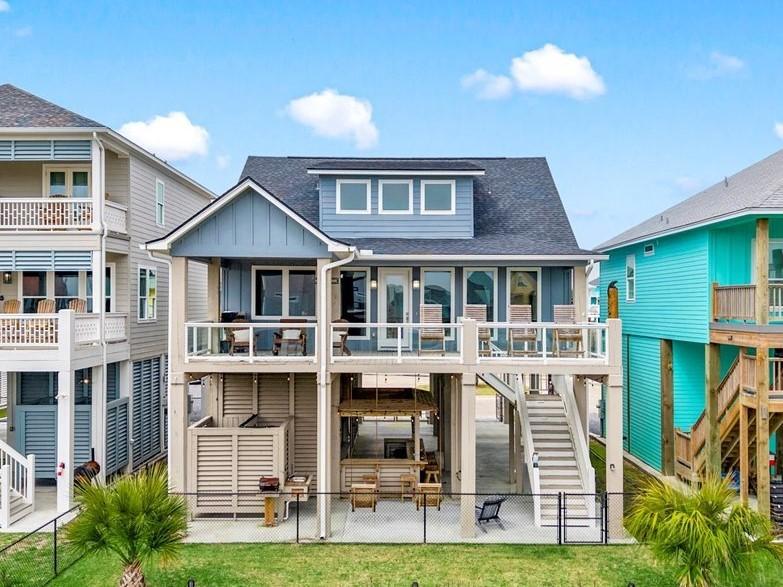 Image 1: Charming coastal home with elevated design, spacio