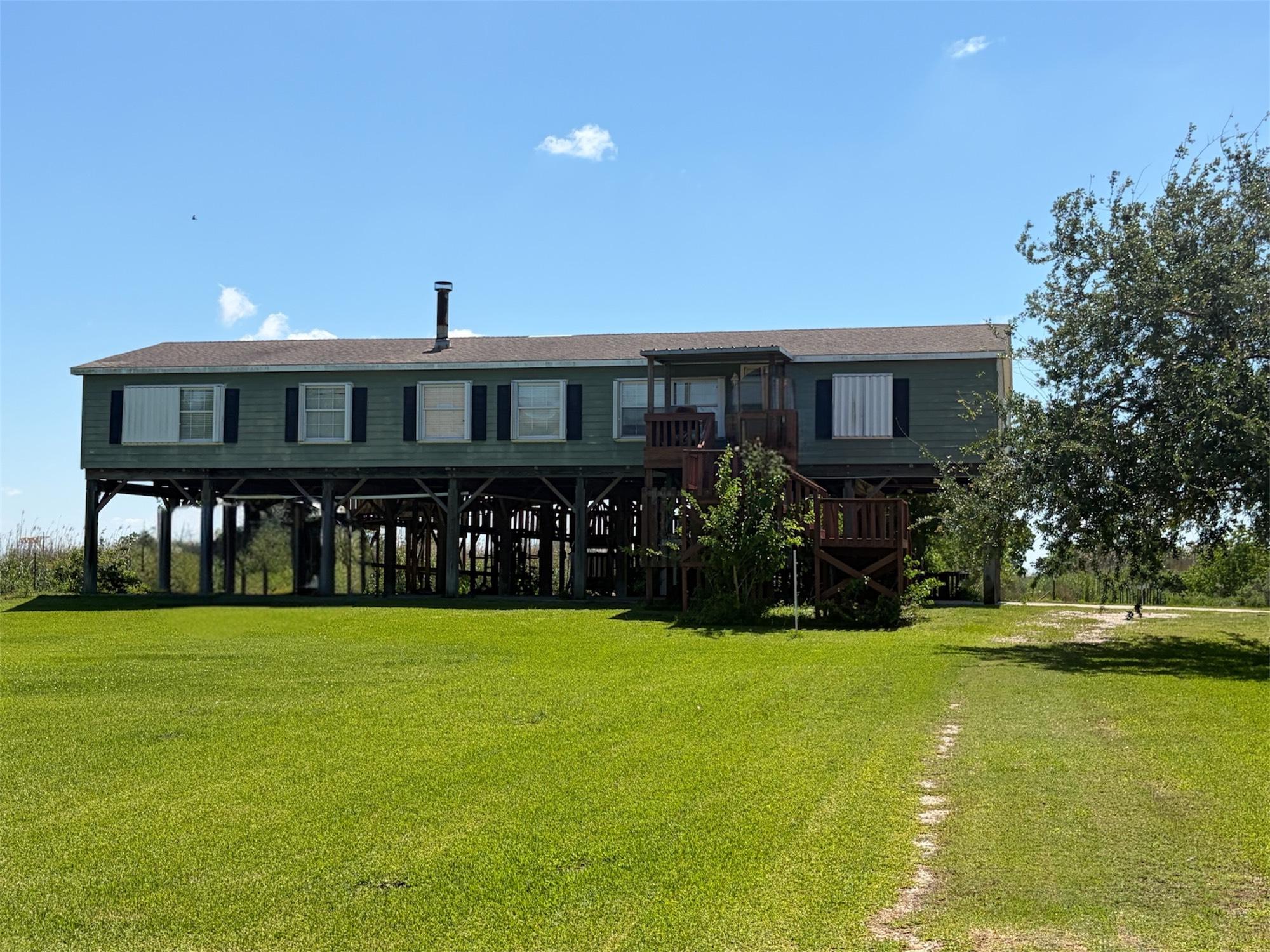 Image 1: Front view of the property