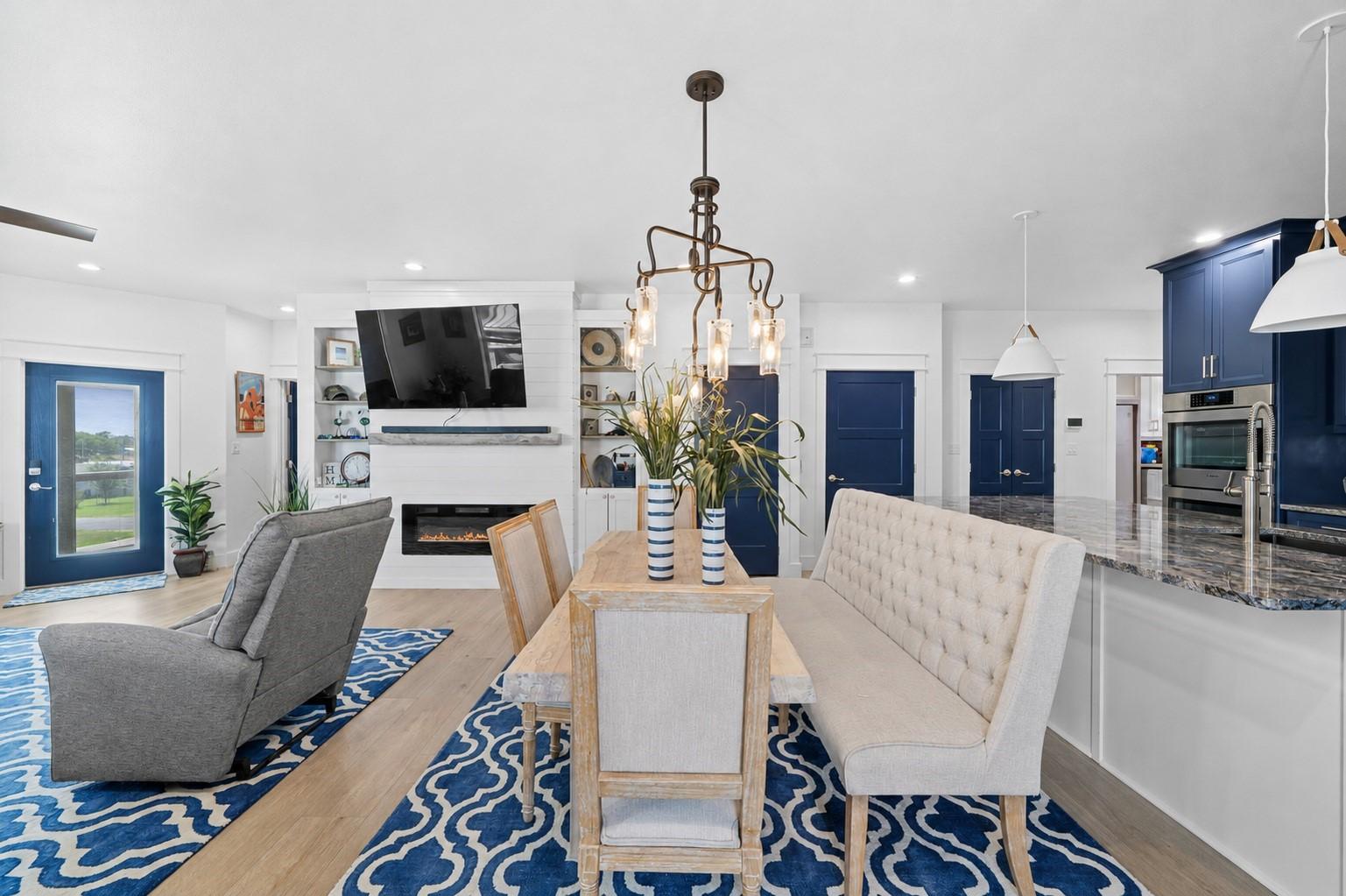 Image 4: Spacious open-concept home interior featuring ligh
