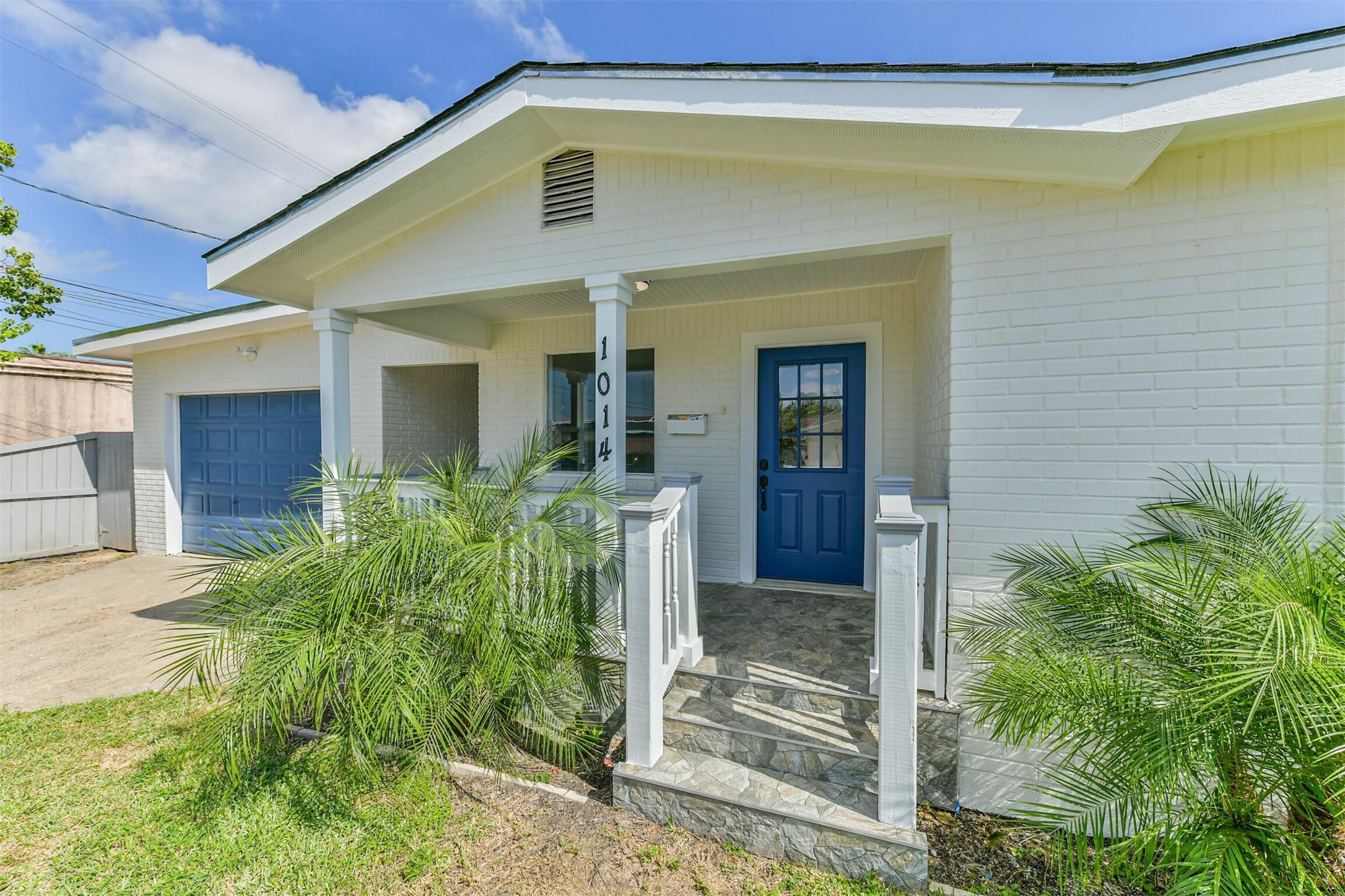 Image 3: Enjoy a covered front porch, a spacious room for r