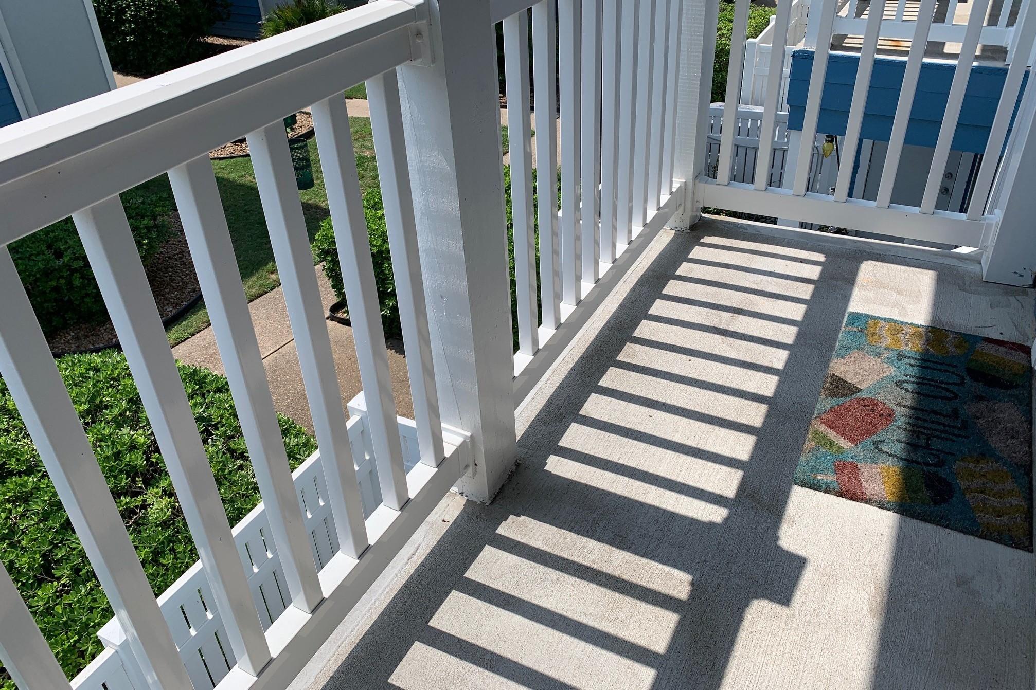 Image 4: Small balcony off the living room has room for a b