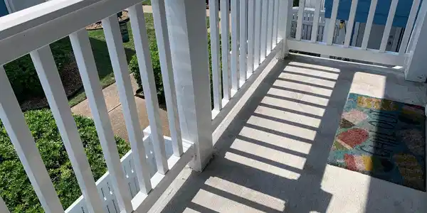 Image 4: Small balcony off the living room has room for a b