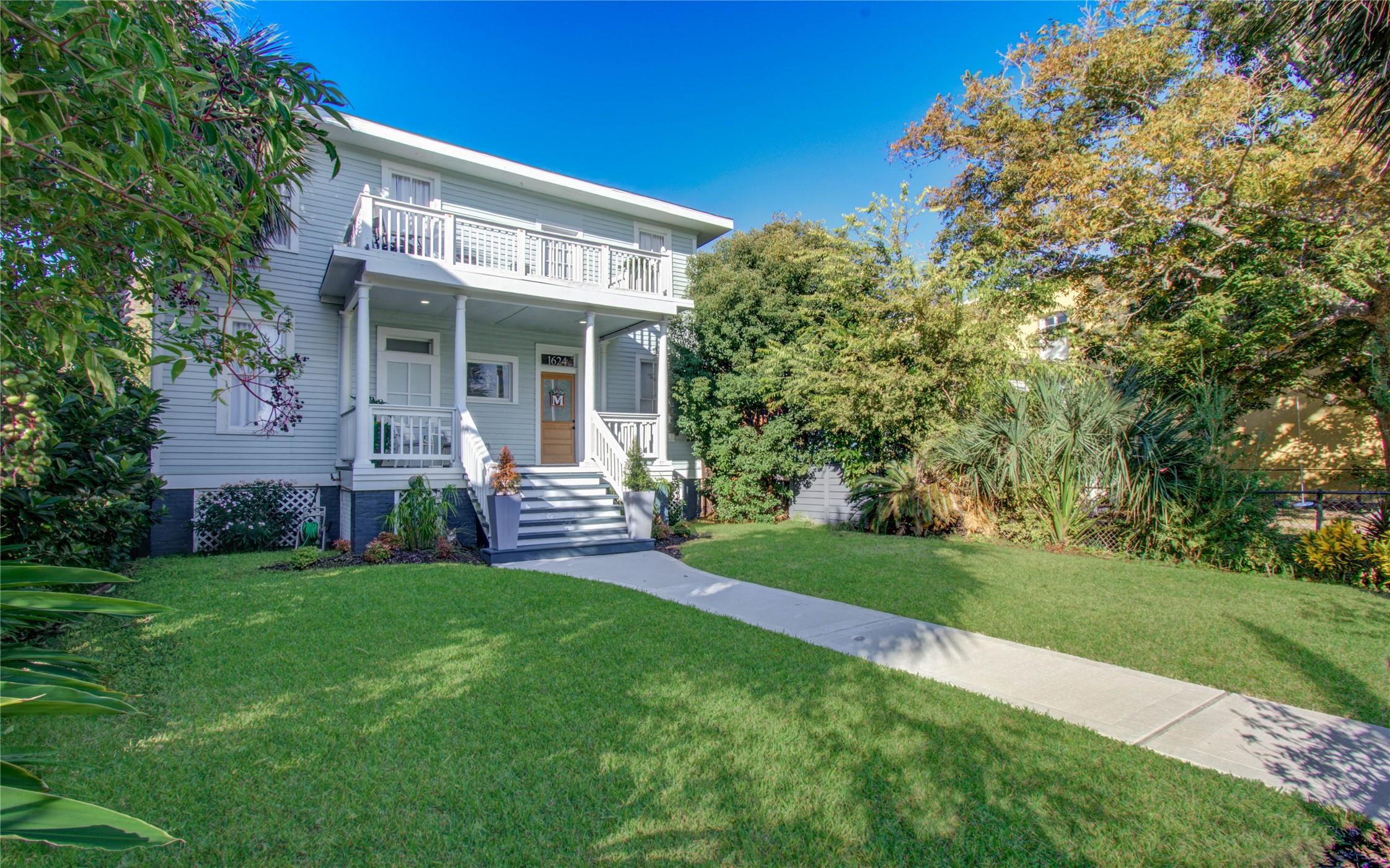 Image 2: This Galveston historic home features a well-maint