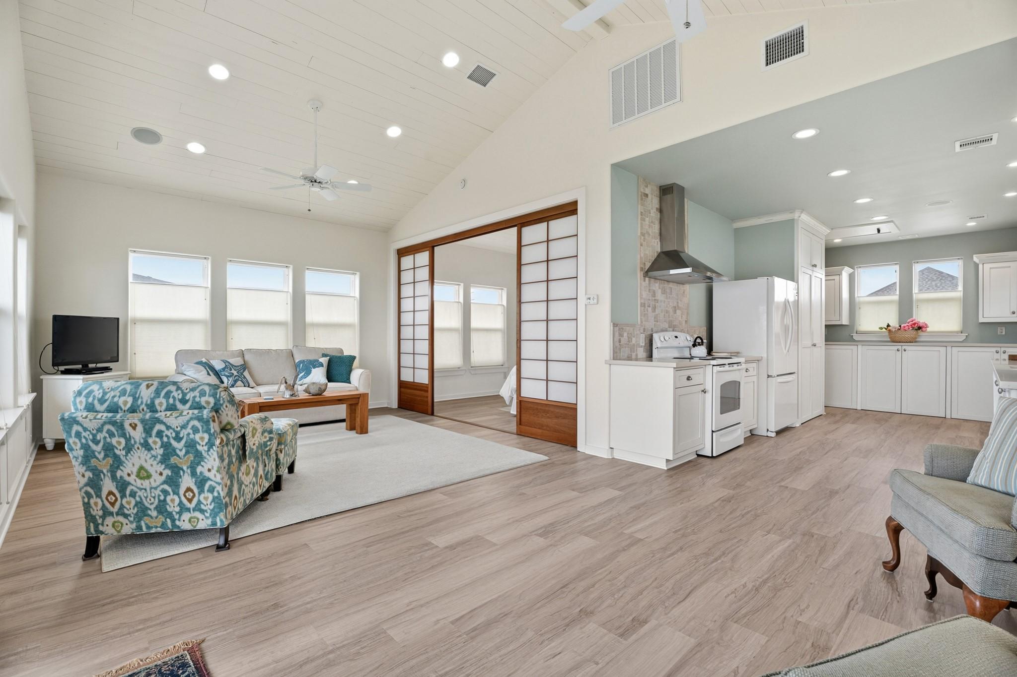 Image 4: This spacious area lends itself to entertaining. T