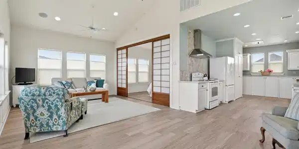 Image 4: This spacious area lends itself to entertaining. T