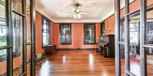 Image 4: Looking From the Entryway, These Double Doors Lead