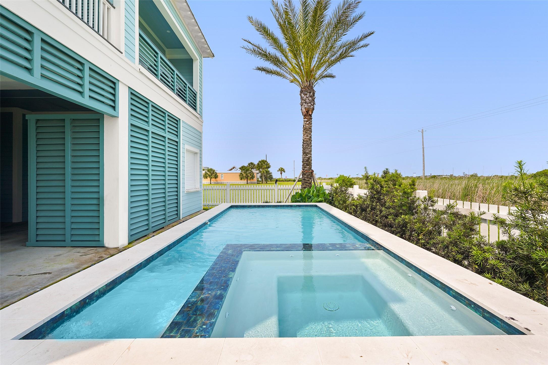 Image 3: A PRIVATE POOL AND SPA set alongside the home, fra
