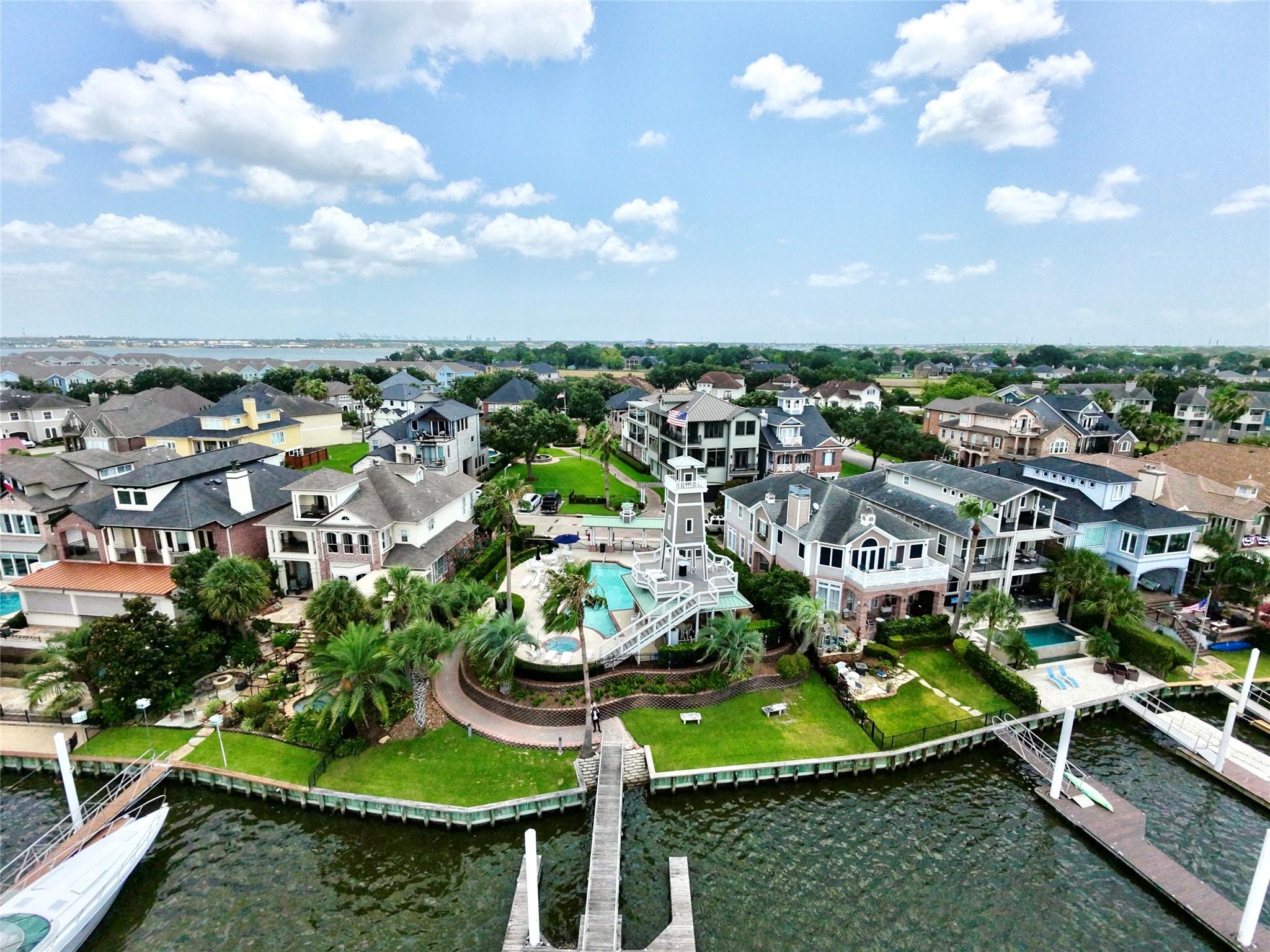 Image 2: Community View Featuring the community pool, water