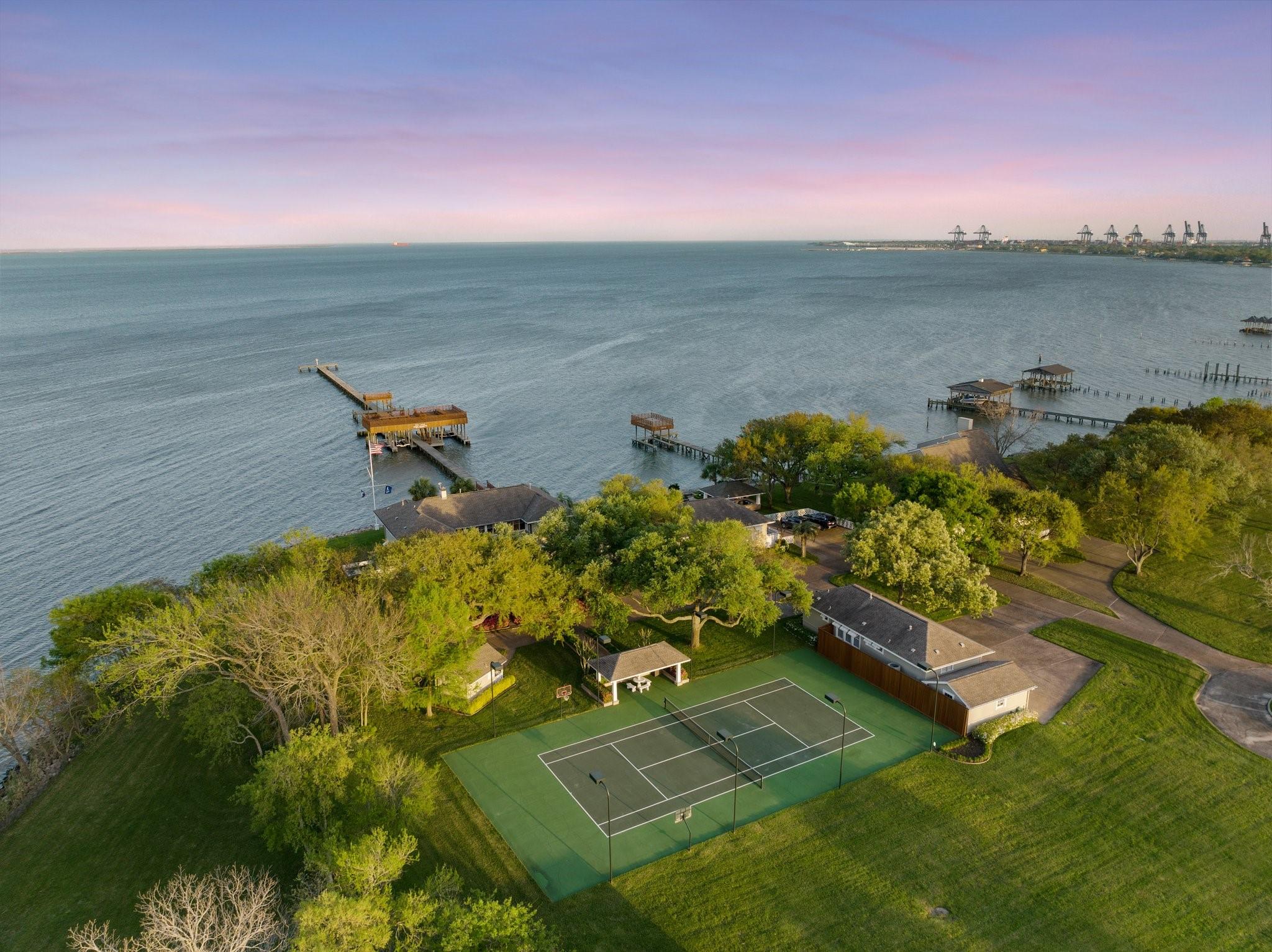Image 1: Aerial view looking out to Galveston Bay.