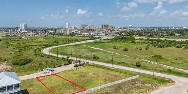 Image 4: Elevated aerial perspective highlights the lot's p