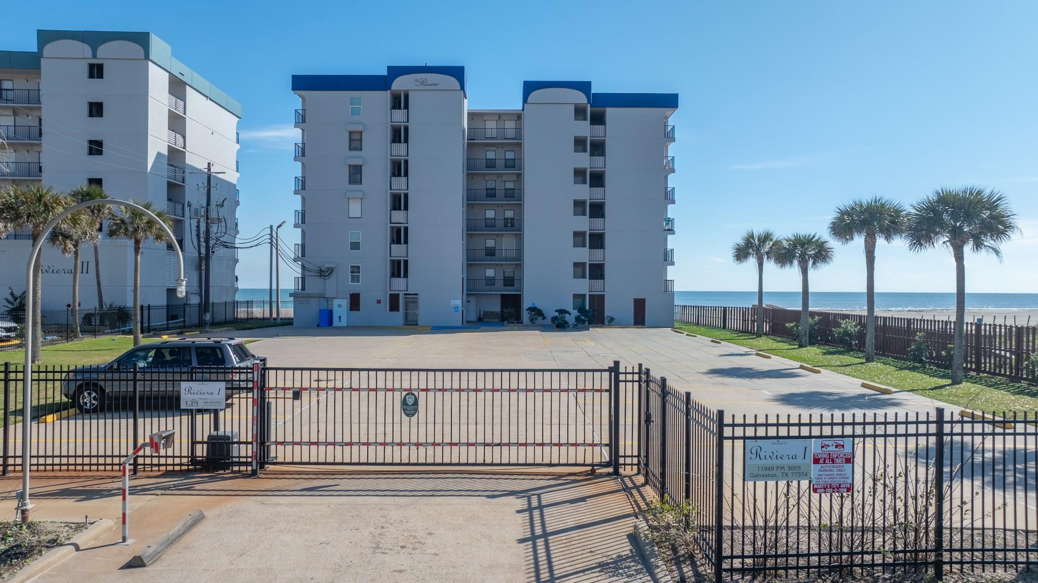 Image 2: The parking area offers private coded gates for yo