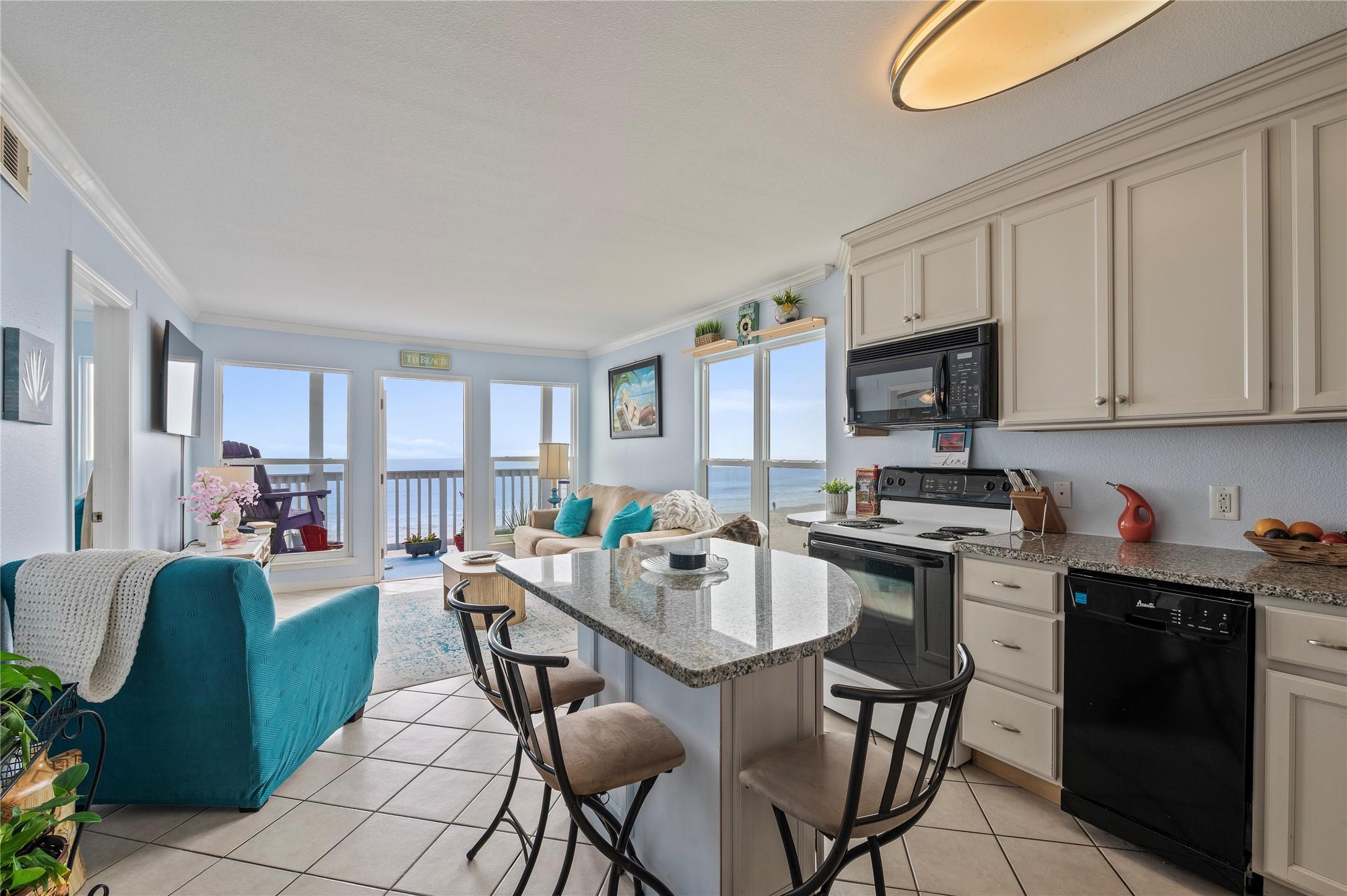 Image 2: Top floor corner unit with a view of both the sunr