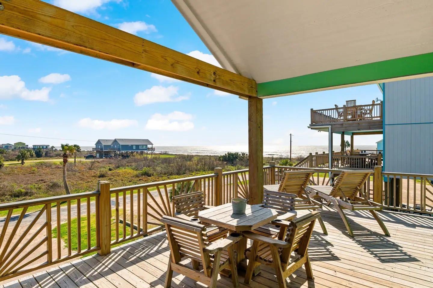 Image 2: Spacious wooden deck with comfortable seating, off