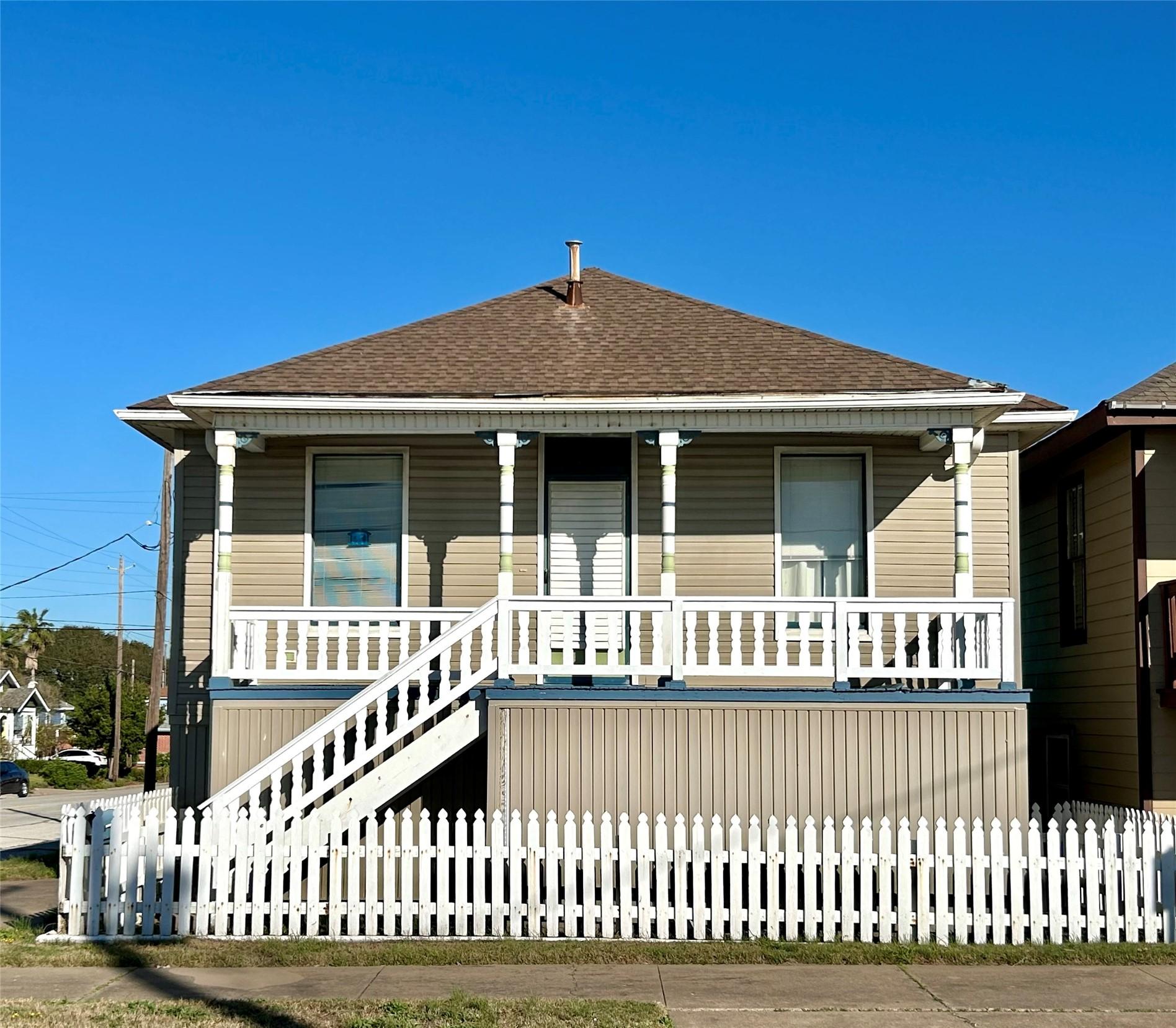 Image 1: Front oh home facing the beach