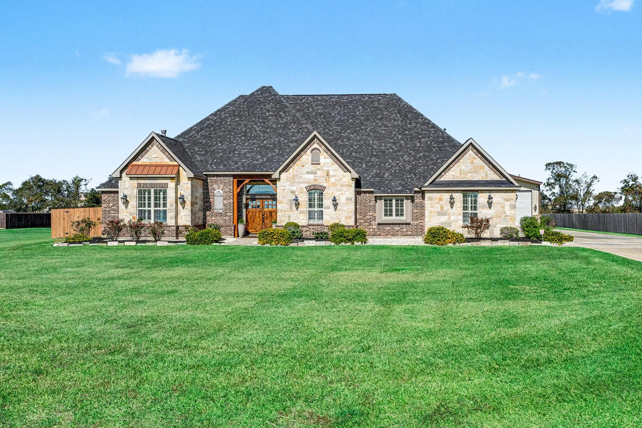 Image 2: Street view of home during day