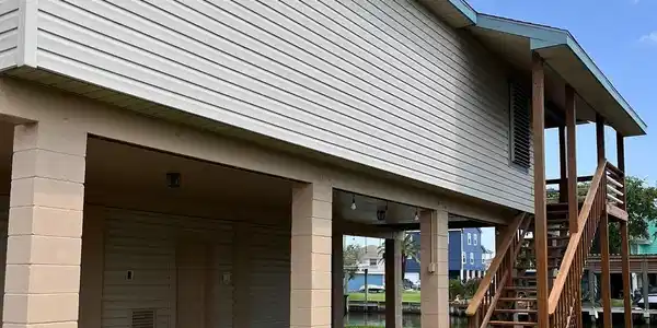 Image 2: Home faces southeast toward Galveston, situated mo