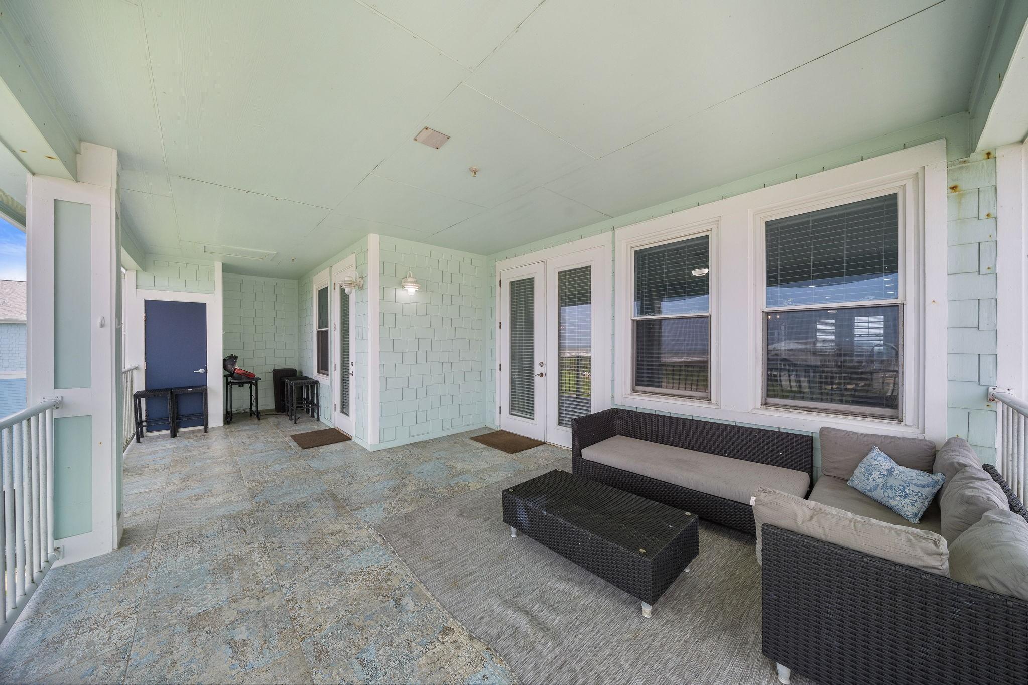 Image 4: This generous balcony with access from both the li
