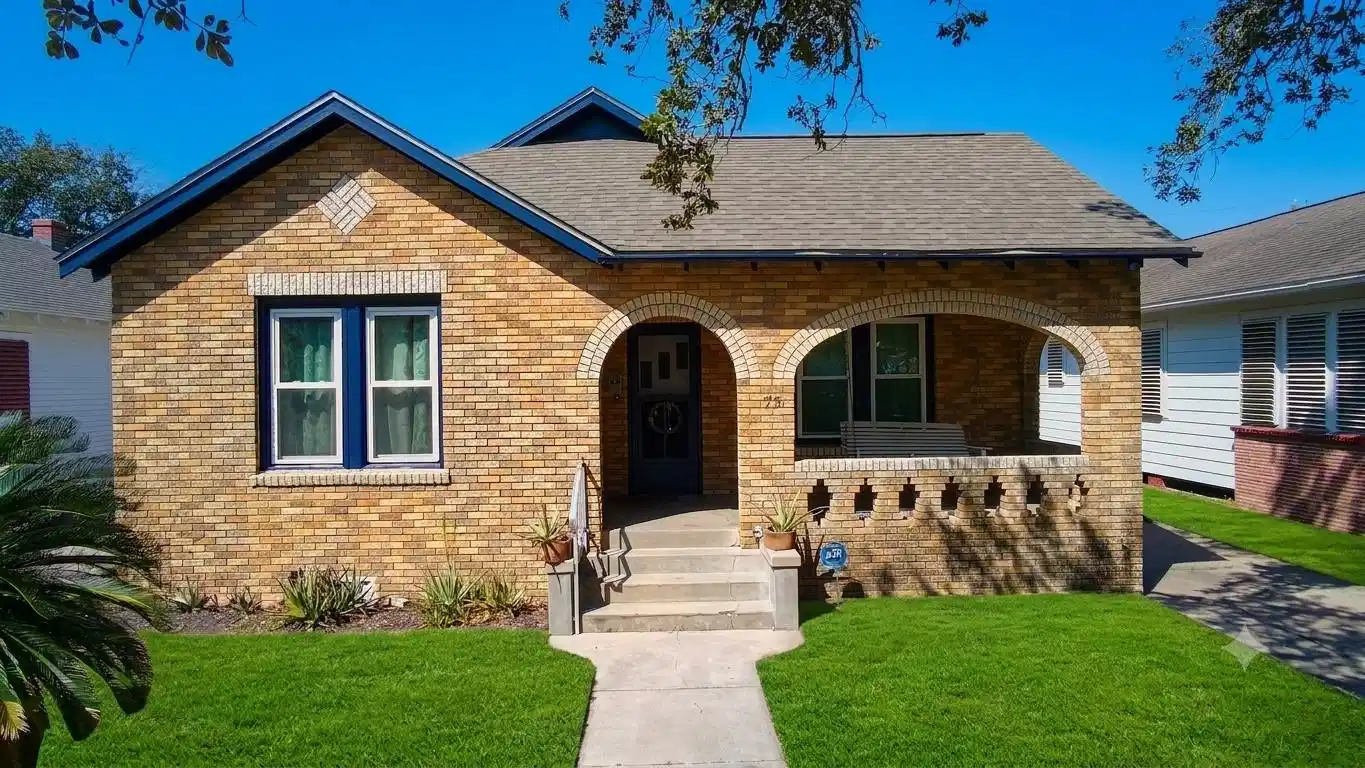Image 1: Gorgeous brick bungalow features recent updates, 3