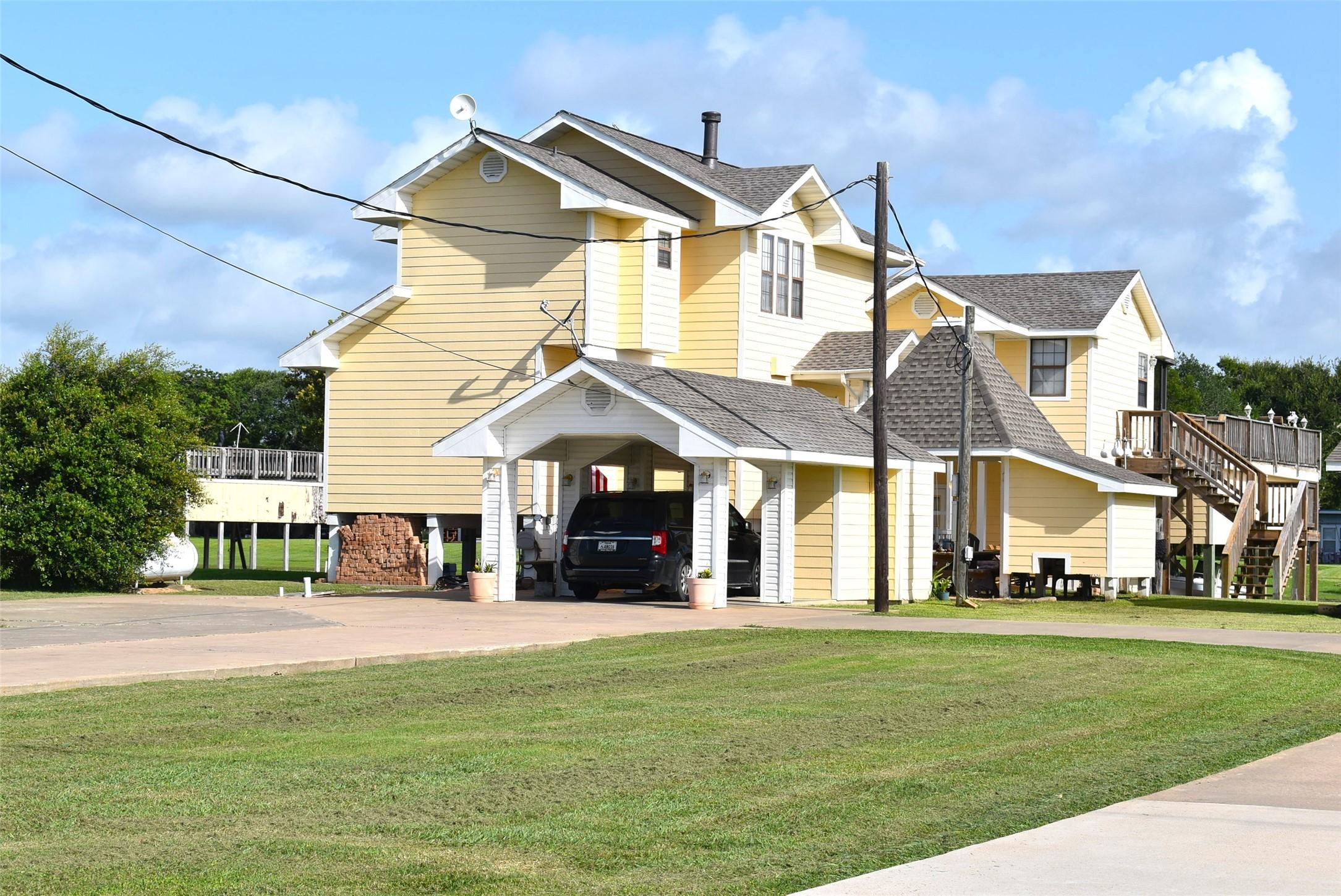 Image 3: Lots of storage in carport area