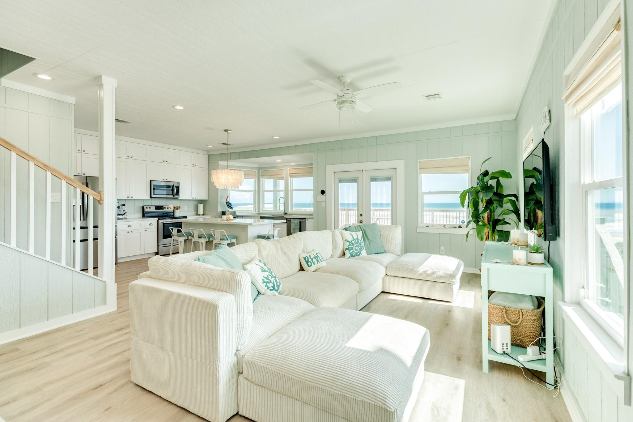 Image 4: Living Room &ndash; Open Concept with Gulf Views &ndash; Brigh