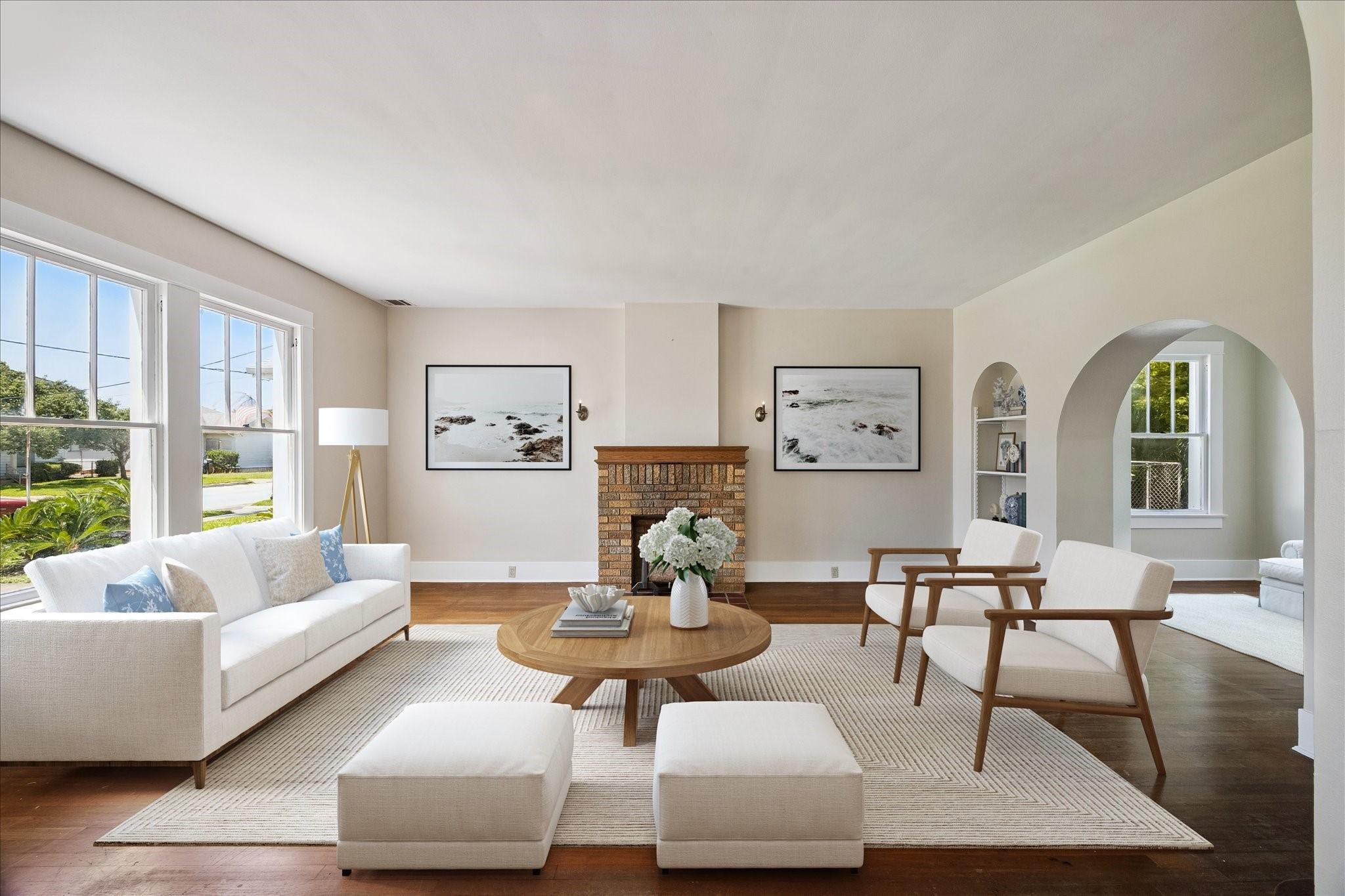Image 2: *Virtually staged* This inviting living room featu