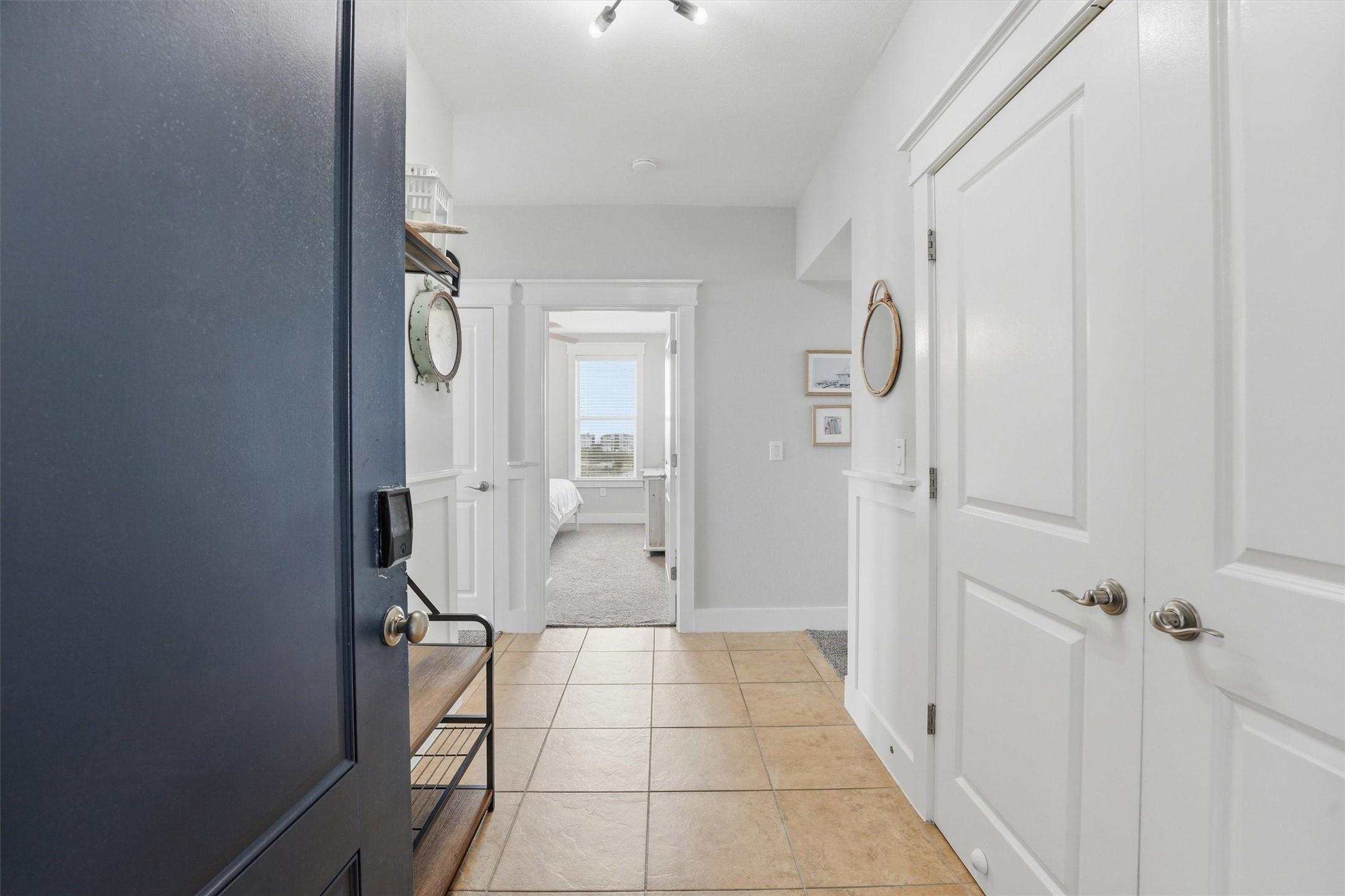 Image 4: Step inside to a bright, clean entry with tile flo