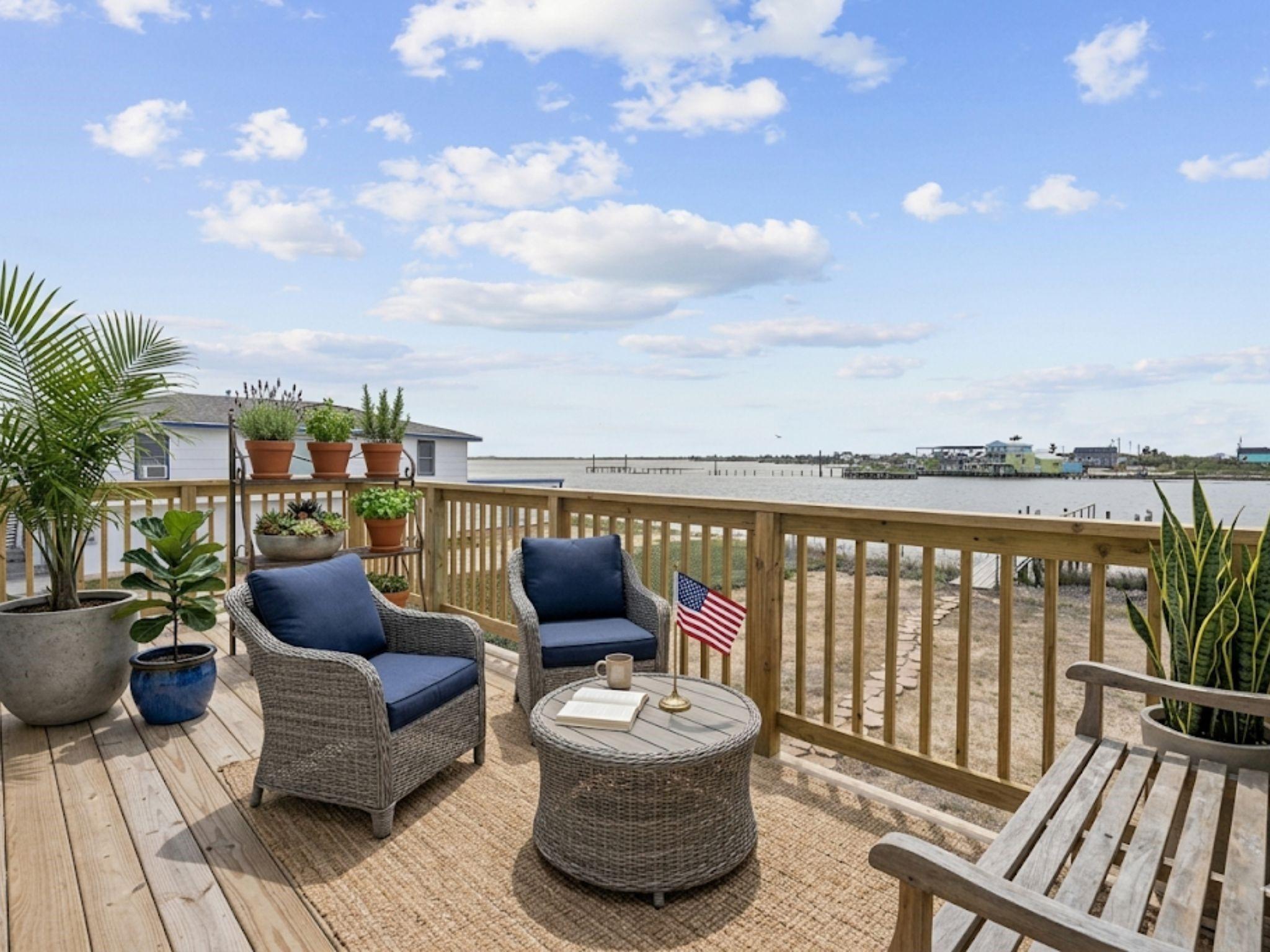 Image 3: This large deck serves as a perfect hangout area o