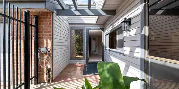 Image 4: The front partially shaded private patio area, the