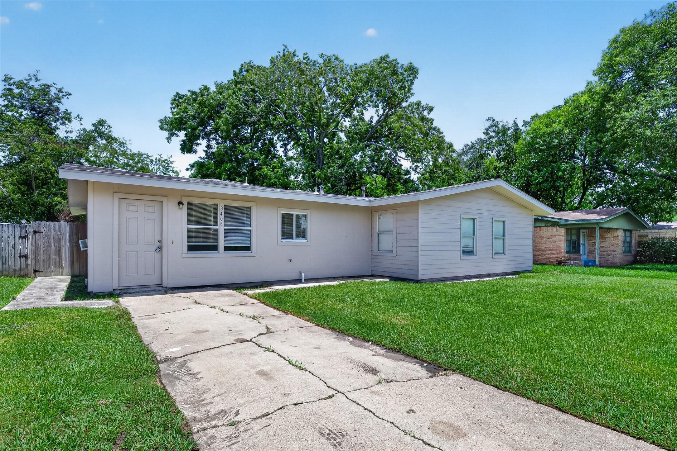 Image 3: Discover this charming single-story home featuring